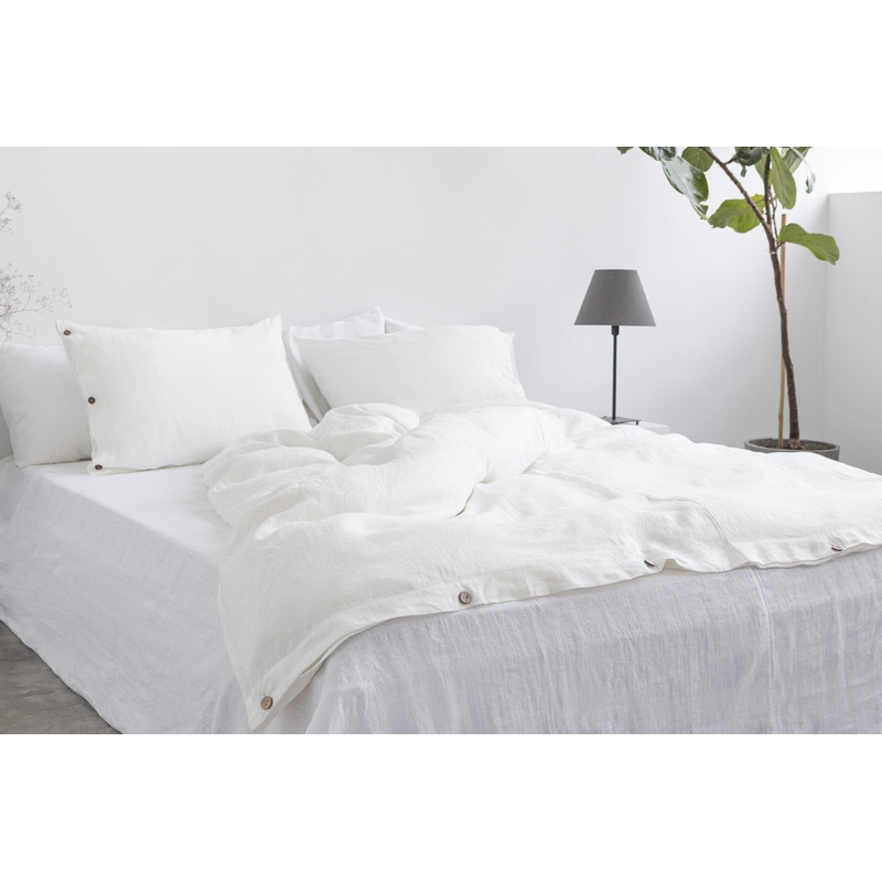 White linen duvet cover with coconut buttons