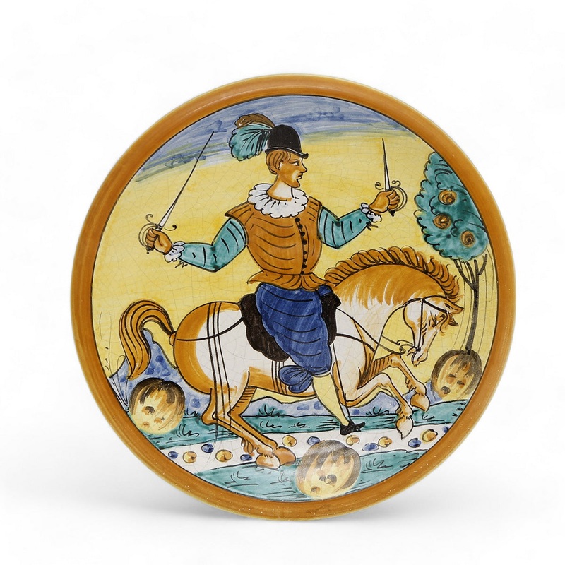 TUSCAN MAJOLICA: Medium wall plate featuring equestrian medieval man (14″ DIAM)
