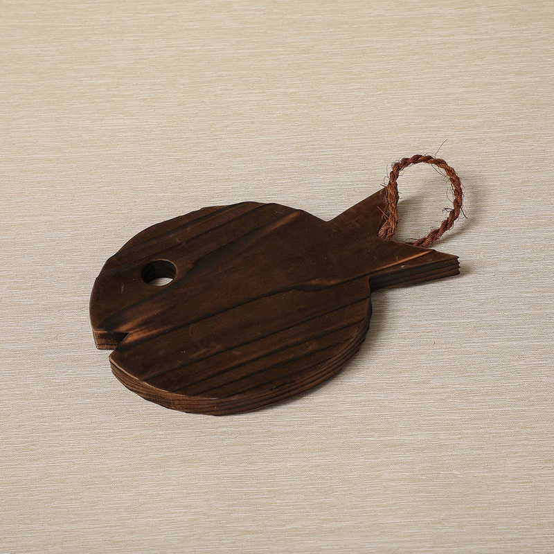 “Fish” trivet with handle